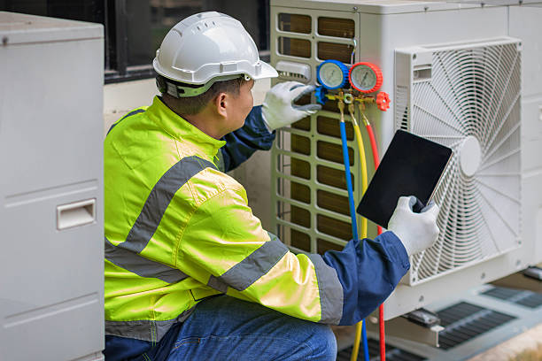 Professional Heat Pump Repair technician working in Plattsburg, MO